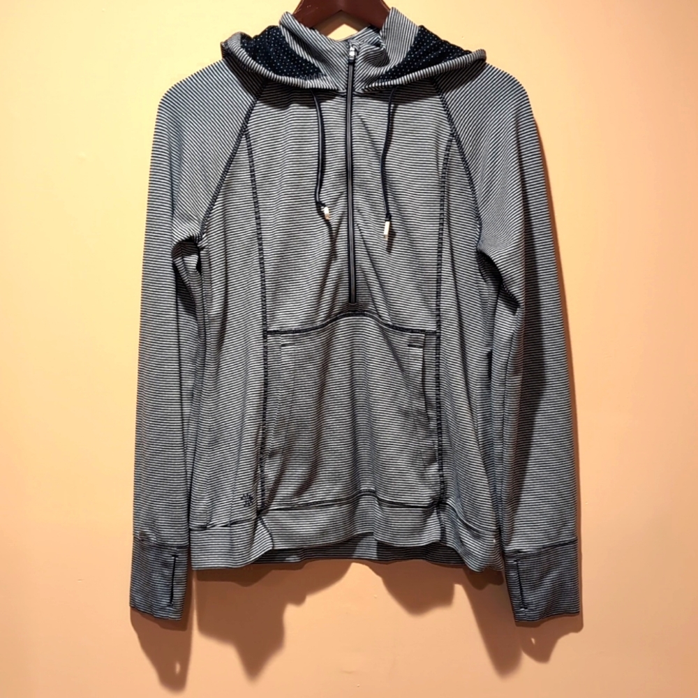 Like new Athleta quarter zip hoodie. Women's size M.